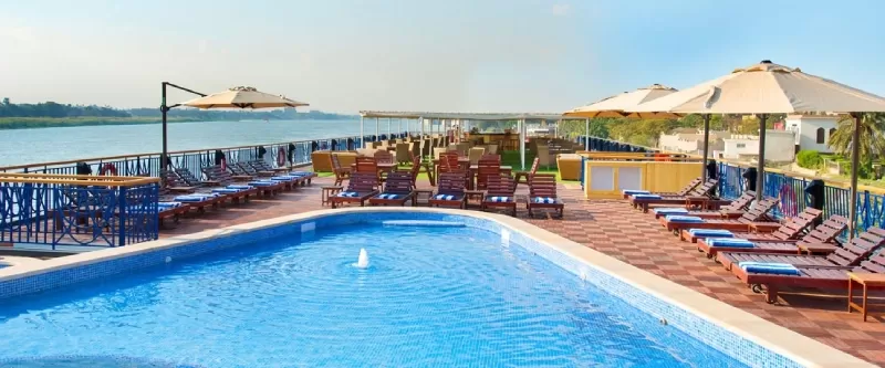 Sundeck aboard MS Amwaj Living Stone Nile Cruise – pool, sun loungers, and panoramic Nile views